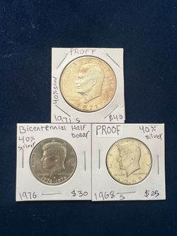 Eisenhower dollar and 2 half dollars (40% silver) 3 pieces