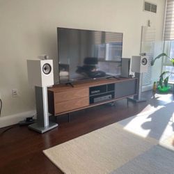 B&W 705 S2 bookshelf speakers in satin white, with matching FS-700 S2 stands.