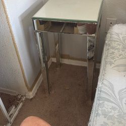 Two Mirrored Tables