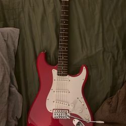 Squier electric guitar with amp and cable