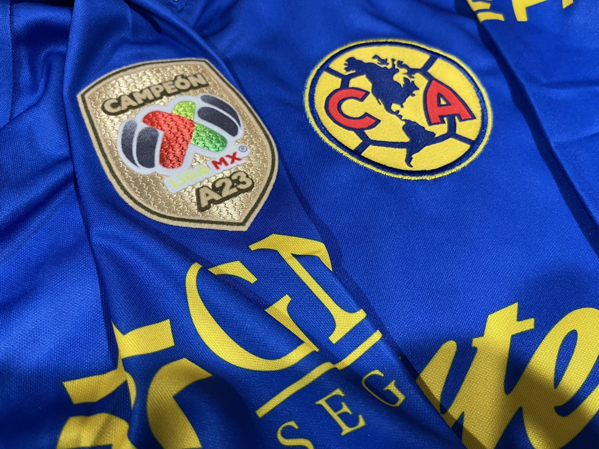 Nike Club America blue jersey with new champion patch