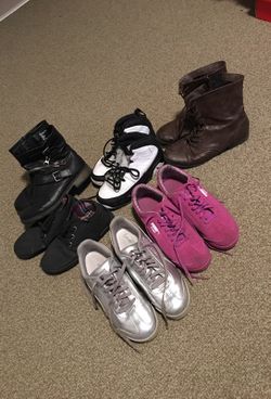 2 Pumas, 1 pair of Jordan's, 1 Brown Boot & 1 Black Boot & 1 pair of Toms