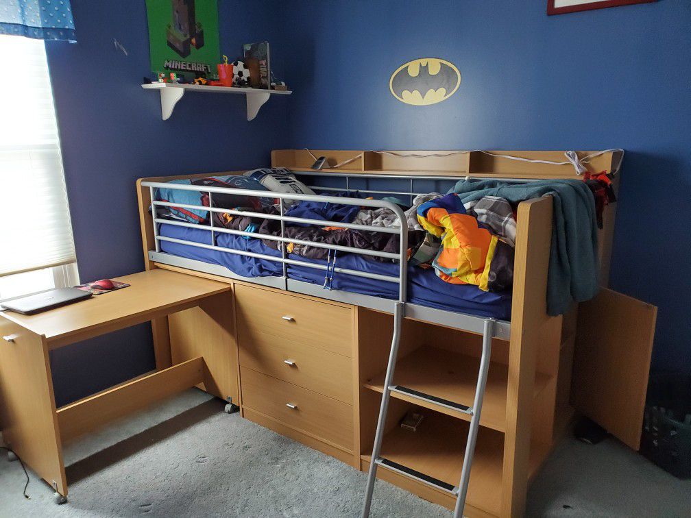 Twin loft bed with desk, three drawers, and storage
