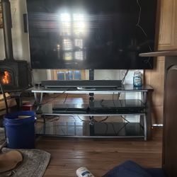 Samsung 65” Hi Def Tv And Stand With Swivel Mount