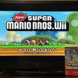 Nintendo Wii Bundle - 2 Remotes + Wii MotionPlus + Super Mario Bros + Wii Resort