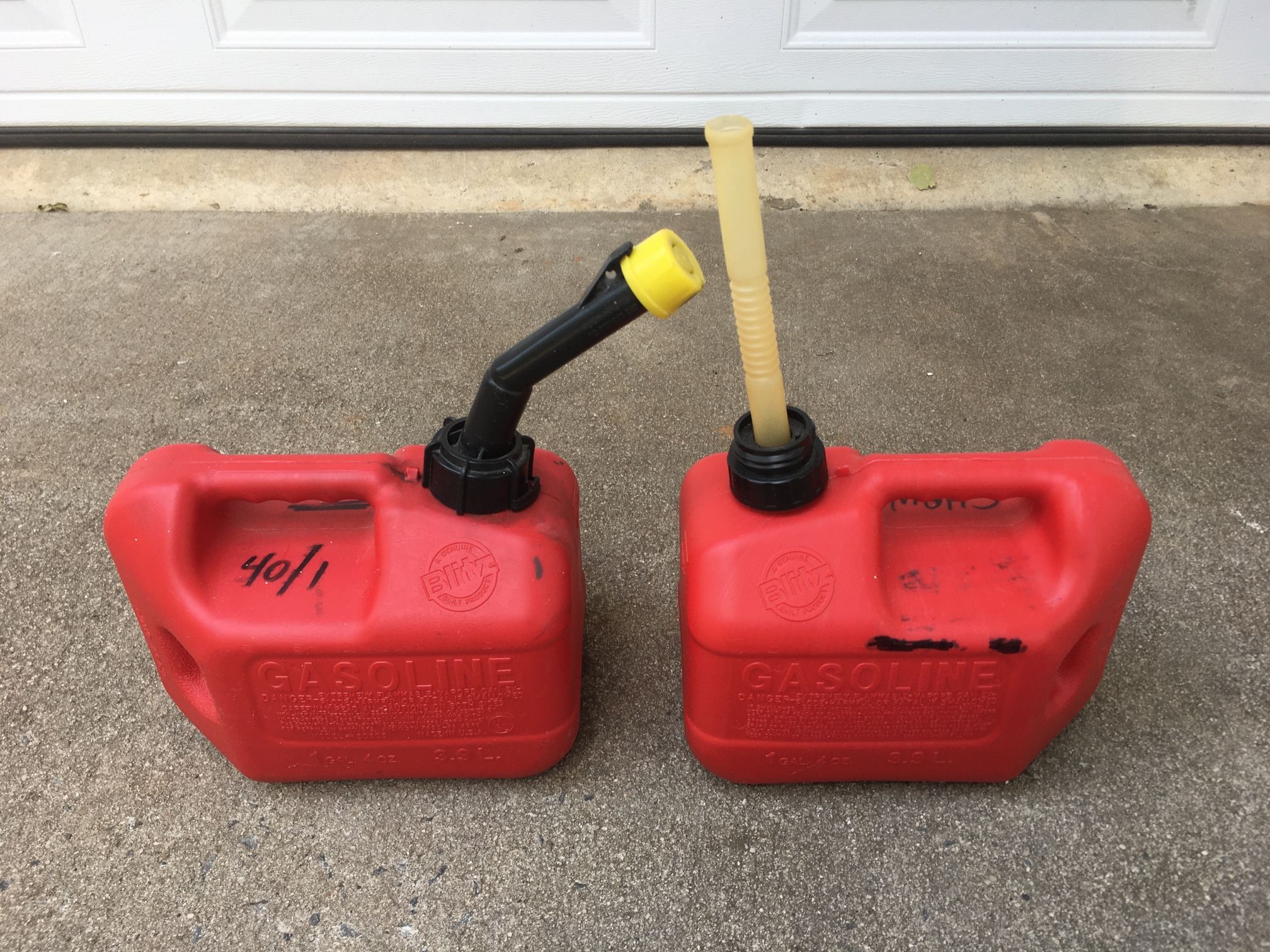 Pair of 1 gal. 4 oz. Gas Cans