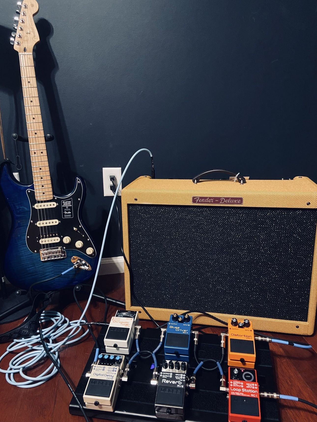Fender Strat, Fender Tube Amp, and Guitar Pedals