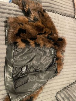 A beautiful short French-made fur jacket, very expensive. ( karllagerfeld)