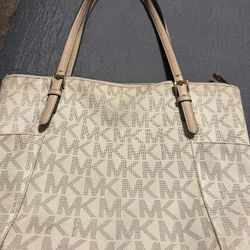 Used Michael Kors Purse $50. 