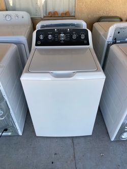 Washer brand GE 60 Days Of warranty free delivery and installation