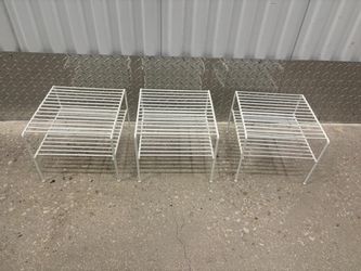 Three white metal Storage racks .. 10 x 10 . 9 “ high $30 for all