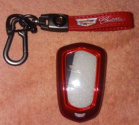 Cadillac Keychain w/case (red) info in pics