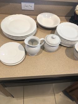 Set of white dinnerware