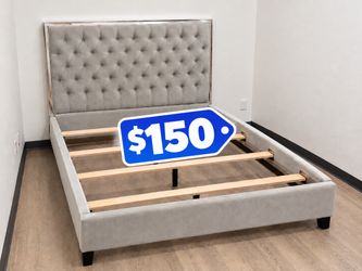 Gray tufted queen bed frame