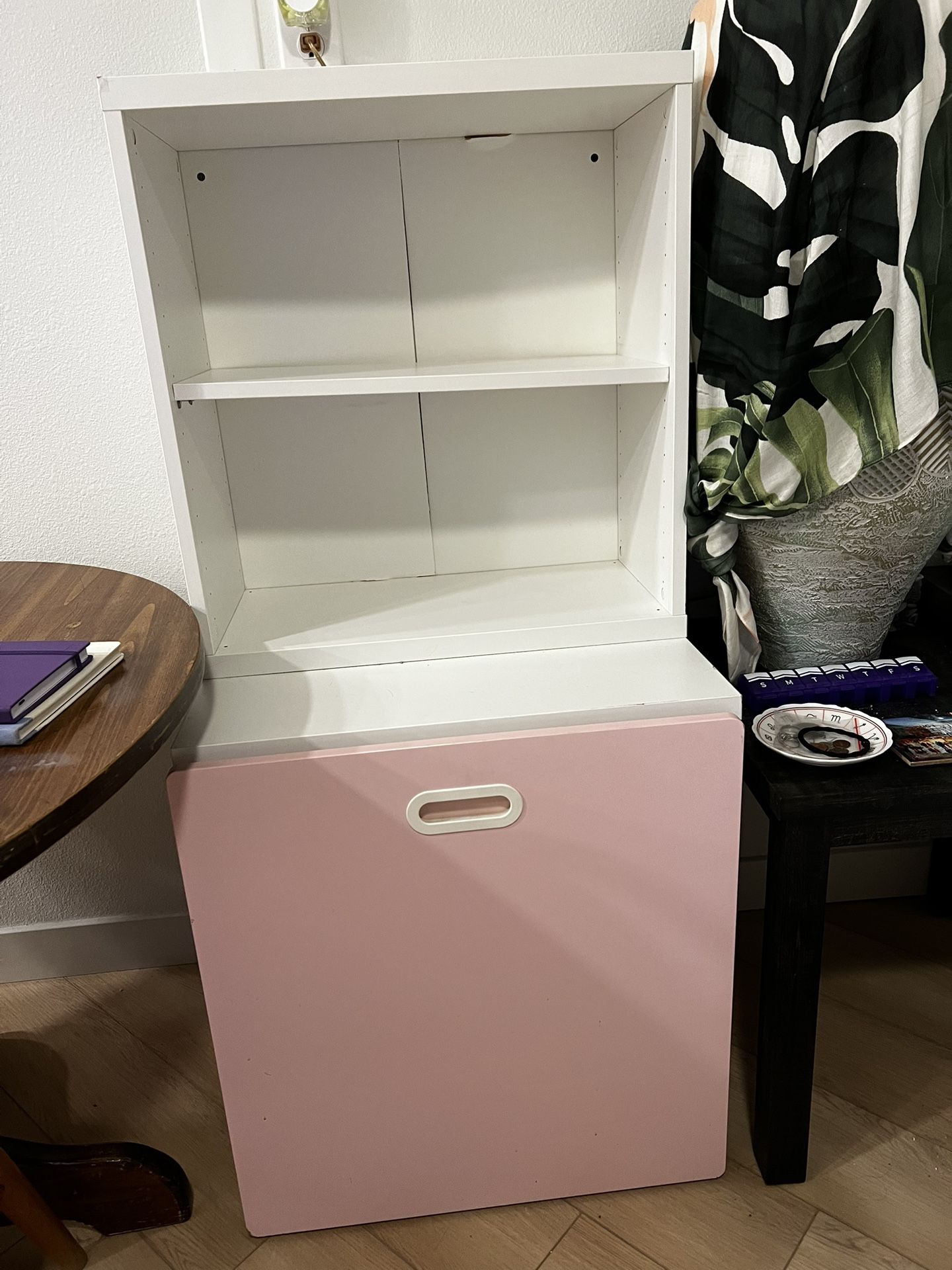 White Two-Shelve Bookcase With Pink Drawer For Storage And Hidden Shelf