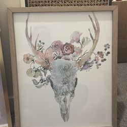 Deer animal skull with flowers