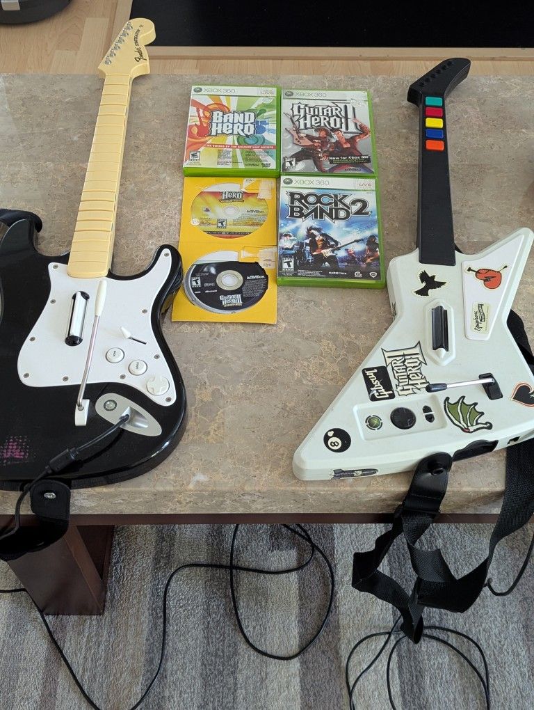 Guitar Hero/Rock Band guitar controllers and games (Xbox 360). Six (6) rhythm controller games.