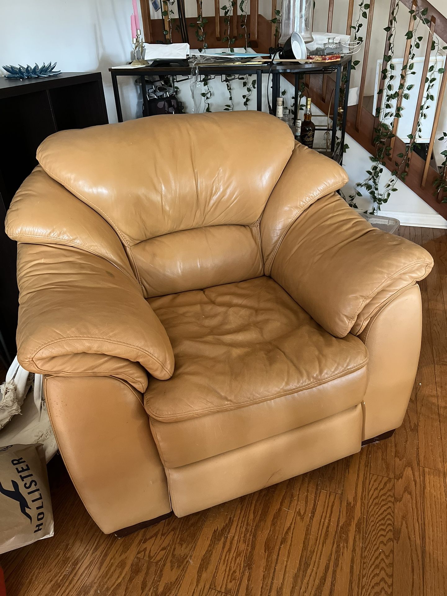 Orange Leather Chair And Matching Ottoman