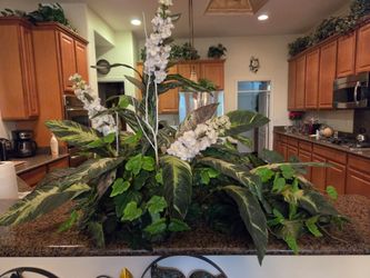 Silk flowers, decorations $ fifty dollars each, perfect. Large