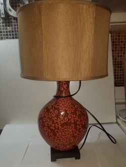 Classy lamp with wooden base. Price to sell it fast