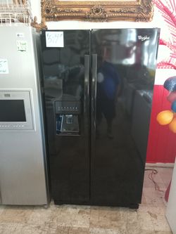 Beautiful Whirlpool Black Side by Side Refrigerator excellent . Warranty . Delivery available . 2203 Fowler st. Ft. Myers 33901