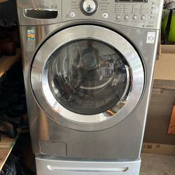 Washer And Dryer Set With Pedestals. LG