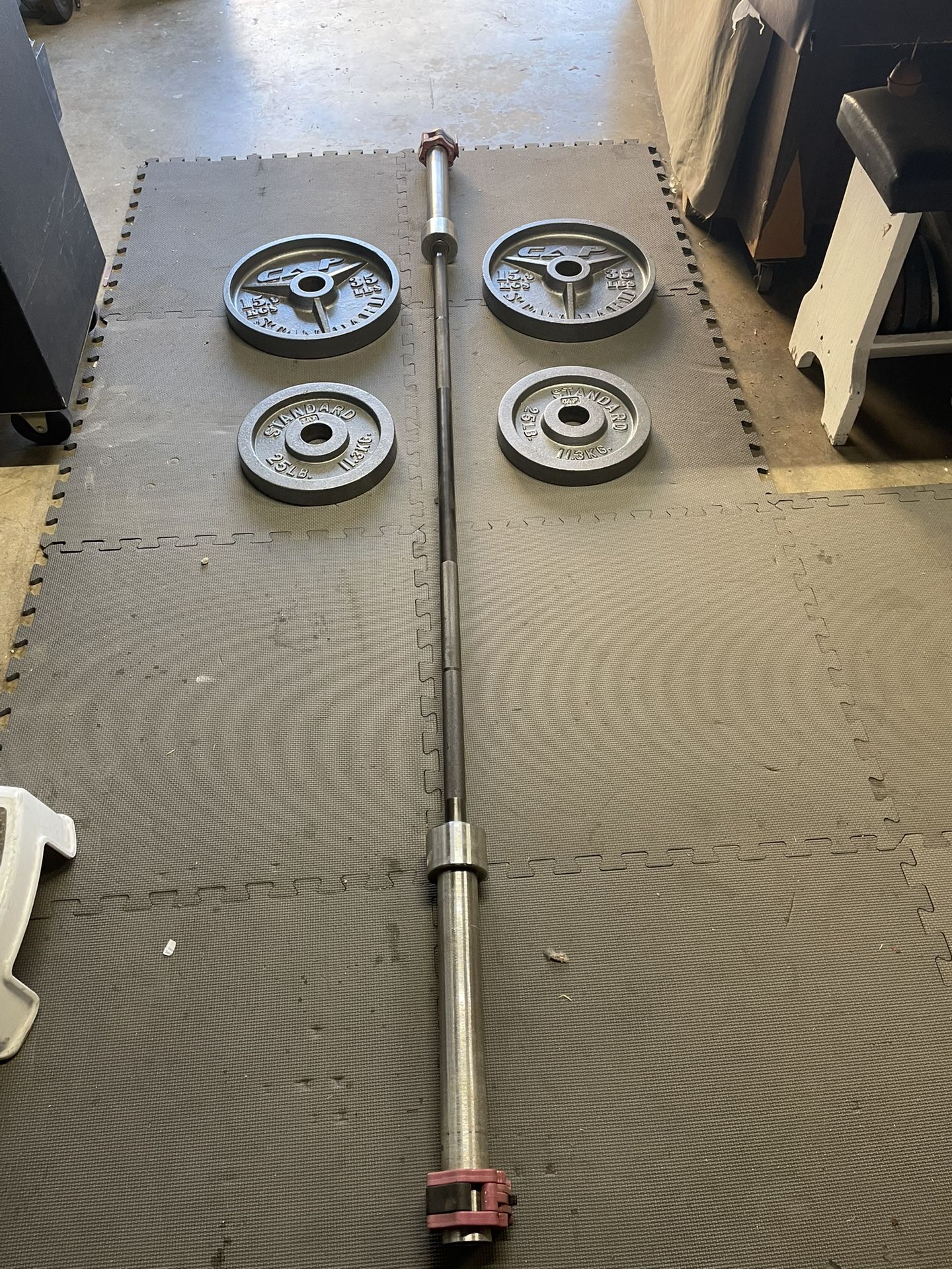 Olympic Weight Plates / Bar. 150. Dollars