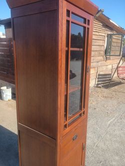 Nice heavy Cabinet with drawers and futon couch/bed  ONLY  $65  bucks