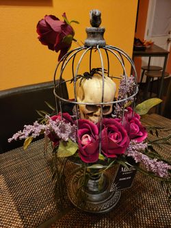 NEW. Beautiful Martha Stewart Halloween decor. Skull in a bird cage cloche stand with roses