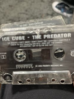Three ice cube cassette tapes, death certificate and the predator not sure of the last one