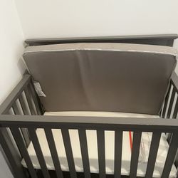 Grey Delta Mini Crib In Great Condition