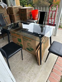 Modern Glass Dining Table with 4 Black Chairs