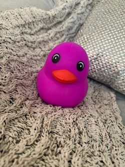 PURPLE SQUISHY DUCK