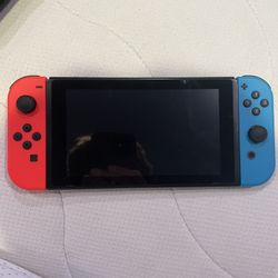 Nintendo Switch with Dock + all the Cables ect.