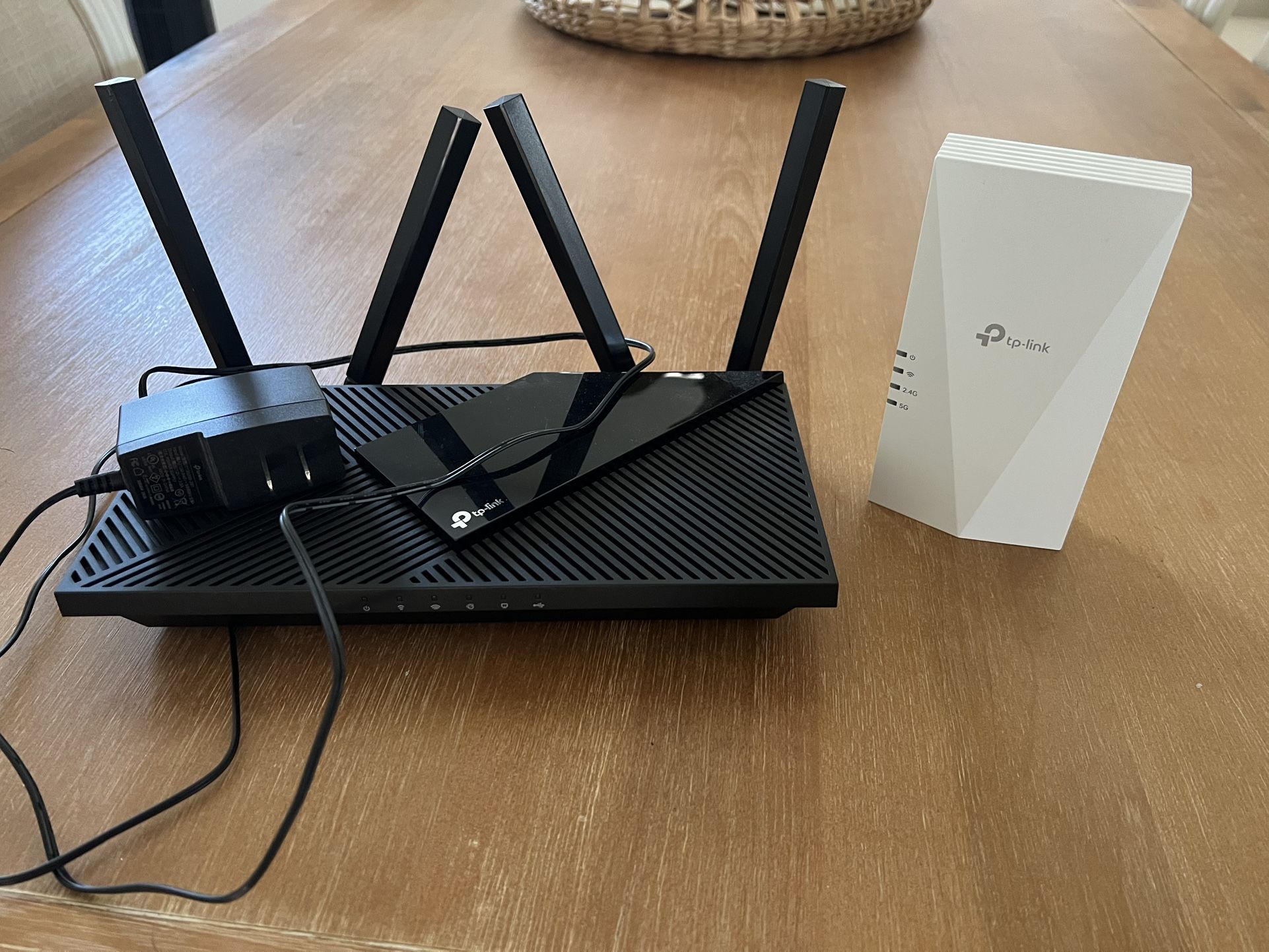 Tp link dual band ax 3000 router and TP link AX 1500 booster
