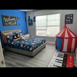 full-size bed frame Tan in color 