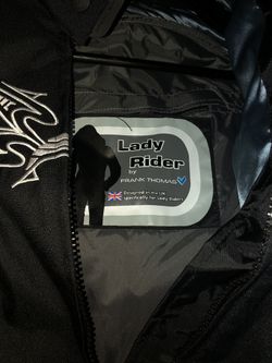 Lady ride a motorcycle jacket
