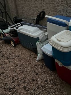 Lawn spreader gas cans coolers grill