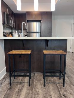 Wooden stool with metal frame