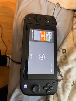 Nintendo switch (accessories and pro controller) comes with two games