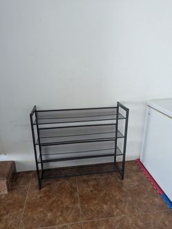Large shoe rack if you still see the ads it's still available