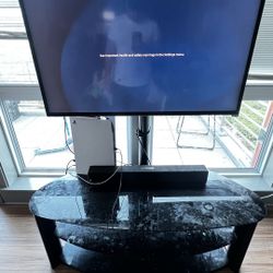 Mounted Tv With Stand And Sound Bar 