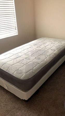 New twin mattress and box spring 2 pc bed frame is not included
