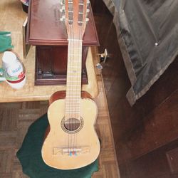 Vintage Monroy Mini Guitar String And He's A String Or Two But It Plays Music