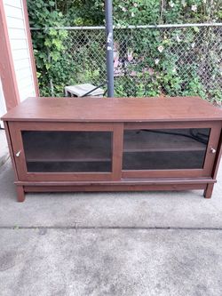 Brown Wood TV Stand with Glass Sliding Doors