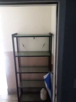 Steel and glass shelves looks brand new