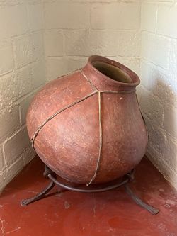Tarahumara pottery vessel with rawhide wrapping