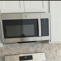 Brand New GE Microwave  $225 Cash