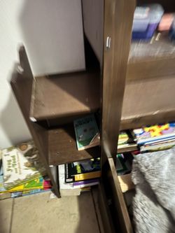 Full size bed frame with sliding bookshelves