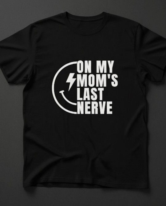 "On My Mom's Last Nerve" T-Shirt
This is a classic-fit crew neck t-shirt in black, featuring a bold, graphic print in white.
Design Focus: The shirt